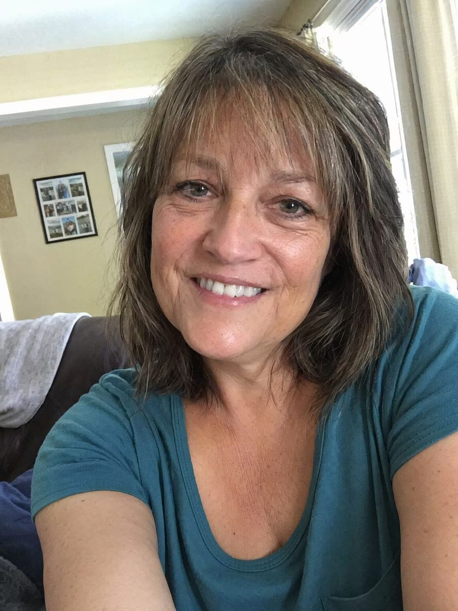 Input selfie before AI ID photo conversion — UK Passport — 35 × 45 mm, light gray
